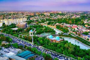 Uzbekistan, Tashkent - April 24, 2023 Top view from the observation deck on the Tashkent TV tower to the central part of the city during the twilight. photo