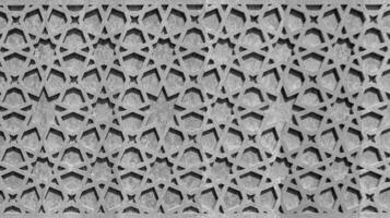 Black and white Geometric traditional Islamic ornament. Fragment of a mosaic.Abstract background. photo