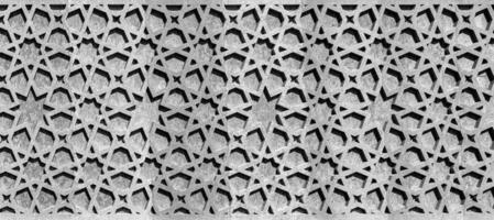 Black and white Geometric traditional Islamic ornament. Fragment of a mosaic.Abstract background. photo