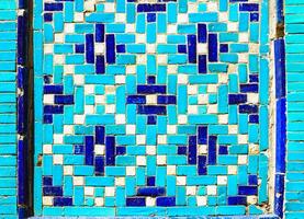 Geometric traditional Islamic ornament. Fragment of a ceramic mosaic. photo