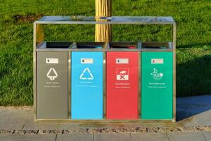 Iron containers for separate waste collection. Waste recycling. photo