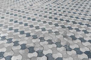 The texture of a stone old pavement with a perspective. photo