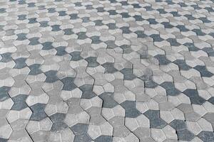 The texture of a stone old pavement with a perspective. photo