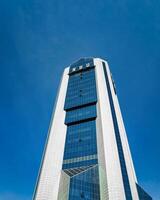 Uzbekistan, Tashkent - March 24, 2023 The building of the National Bank of Uzbekistan against the backdrop of a clear blue sky in Tashkent. photo