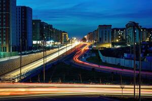 Car traffic light at night city. photo