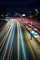 Car traffic light at night city. photo