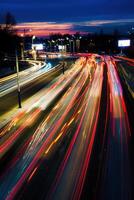 Car traffic light at night city. photo