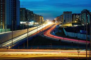 Car traffic light at night city. photo