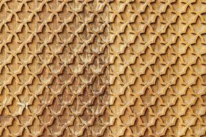 Fragment of an ancient carved wooden pattern. Ornate. Abstract background. photo