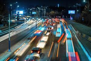 Car traffic light at night city. photo