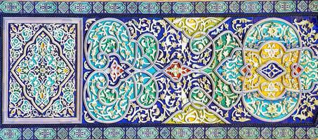 Geometric traditional Islamic ornament. Fragment of a ceramic mosaic. photo