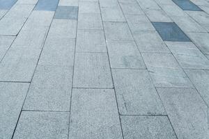 The texture of a tiled pavement with perspective. photo