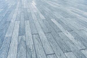 el textura de un gris tablón de madera rayado piso con perspectiva. foto
