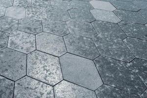 The texture of hexagonal tiled pavement with perspective. photo