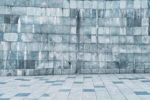 Texture of stone wall covered with tiles and pavement. photo