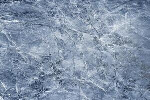 Texture of blue marble tiles with scratches. Abstract background. photo