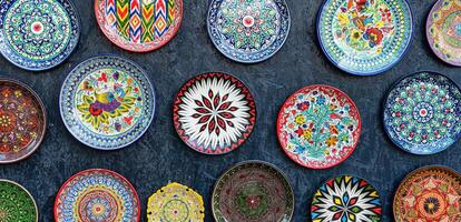 Arabic painted ceramic plates on the wall. photo