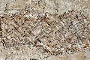 el textura de el marco de un oriental edificio hecho de tejido bambú. resumen antecedentes. foto