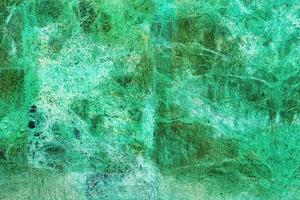 Texture of green marble tiles with scratches. Abstract background. photo