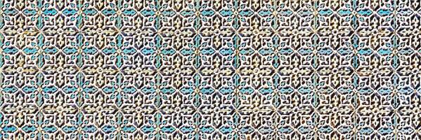 Geometric traditional Islamic ornament. Fragment of a ceramic mosaic. photo