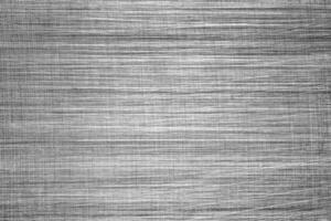 Monochrome texture of shiny scratched metal. Abstract background. photo