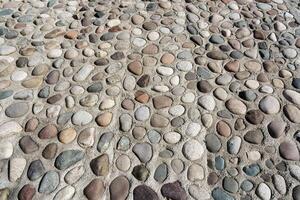 Old antique stone wall texture. photo