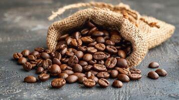 A sack filled with coffee beans resting on a wooden table photo