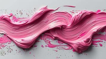 Detailed view of bright pink paint splattered on a clean white background photo