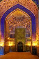 Ornament of the interior of the Registan mosque in Samarkand, Uzbekistan. Muslim oriental traditional geometric ornament. photo