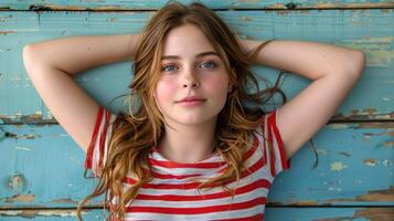 A young girl stands in a pose for a picture photo