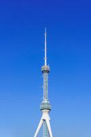 Tashkent Television Tower, Uzbekistan on a blue sky background. photo