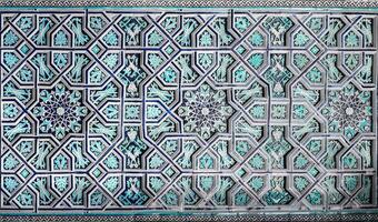 Geometric traditional Islamic ornament. Fragment of a ceramic mosaic. Abstract background. photo