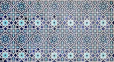 Geometric traditional Islamic ornament. Fragment of a ceramic mosaic. Abstract background. photo