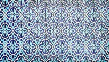 Geometric traditional Islamic ornament. Fragment of a ceramic mosaic. Abstract background. photo