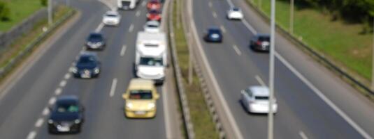 Cars traffic on the highway. Traffic jam on the highway. Blurred view. photo