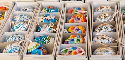 Beautiful colorful decor for Easter. Traditional Easter painted colorful eggs are sold at a market in Prague, Czech Republic. photo