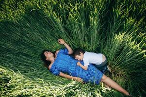 have a little little son resting on nature photo