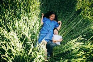 have a little little son resting on nature photo