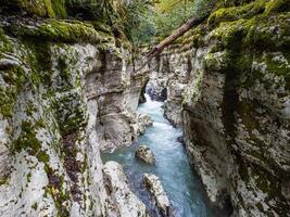 The White Rocks Canyon offers a view of the mountain river between the cliffs photo