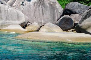 Rocks and stone beach Similan Islands with famous Sail Rock, Phang Nga Thailand nature landscape photo