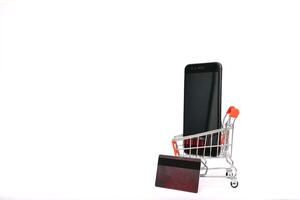 online shopping or internet shop concepts, with shopping cart symbol. isolated. photo