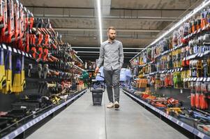 male builder in a hardware store photo