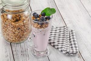 Granola with blueberry and yoghurt photo