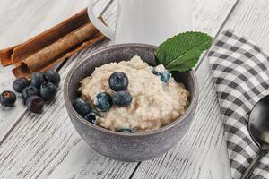 Oats porridge with blueberry photo