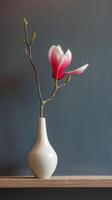 Magnolia Blossom In Vase photo