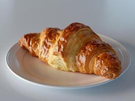 Golden Baked Croissant on Plate photo