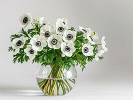 White Anemones In Glass Vase photo
