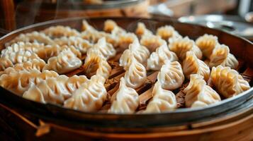 Steamed Dumplings in Bamboo Basket photo