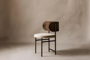 Modern Chair Against Beige Wall photo