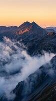 Mountain Peak At Sunrise Mist photo